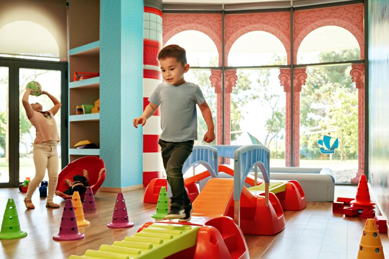 Sheraton Dubrovnik Riviera Hotel Mlini Exterior photo Children playing at the Children's Museum of Oakville